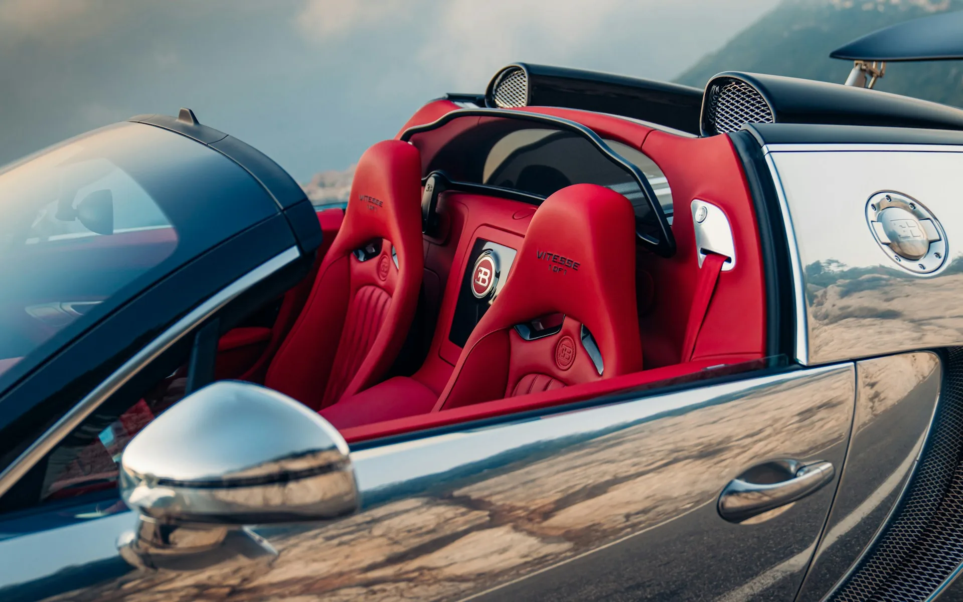 Open cockpit and polished aluminium flank of the Bugatti Veyron Grand Sport Vitesse